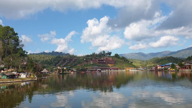 Pan view of Mae Hong Son, Thailand. Lake and resorts in Ruk Thai beautiful nature landscape travel destination slow motion
