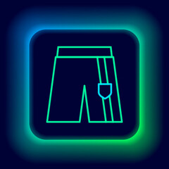 Glowing neon line Short or pants icon isolated on black background. Colorful outline concept. Vector