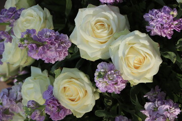 White and purple wedding centerpiece