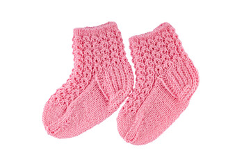 Small knitted pink socks on a white background.