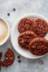 Coffee and cookies. Oat, healthy cookies and coffee cup with milk foam, breakfast concept.