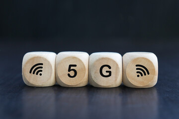 5G network (5th generation) connects the technology of the future around the world. Wooden cubes switched to 5G