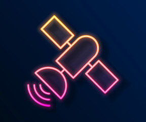 Glowing neon line Satellite icon isolated on black background. Vector