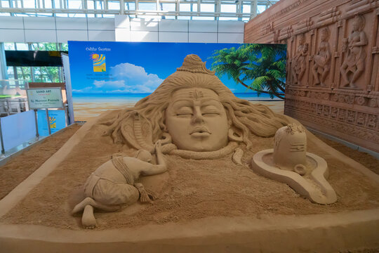 Bhubaneswar, Odisha, India - 23rd July 2019 : Sand sculpture of Lord Shiva at Biju Patnaik International Aiport. Beautiful Indian art.