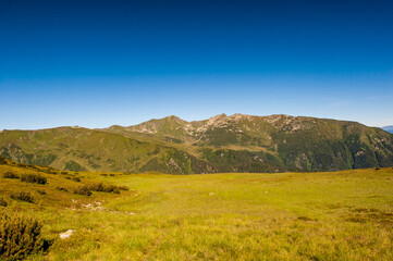 Mountain ridge slopes of Rodna Mountains National Park multiday hike, Muntii Rodnei National Park, Romania, Romanian Carpathian Mountains, Europe.