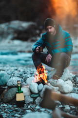 Camper drinks from the cup