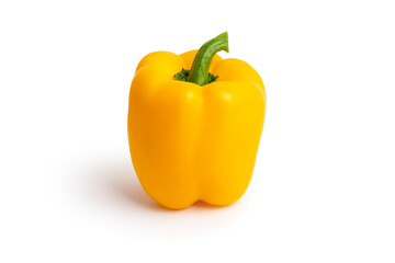 Fresh yellow bell pepper or sweet pepper fruit, Capsicum annuum, with shadow isolated on white background. It is a healthy berry, commonly used as a vegetable ingredient or side dish.