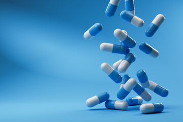 Blue white pills falling on a blue background. 3D rendering.