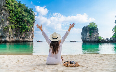 Happy traveler woman on vacation beach joy fun nature view scenic landscape Hong island Krabi,...