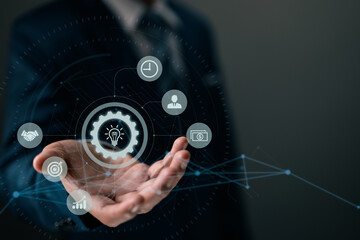 Diagram of business process management and workflow automation with gears and icons in the background and a connection line network. Manager interacting with the user interface.