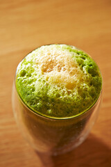 Fresh raw vegetable juice in a cup