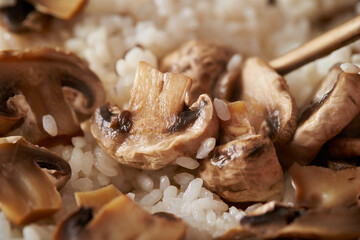 Close-up of sliced mushrooms on rice