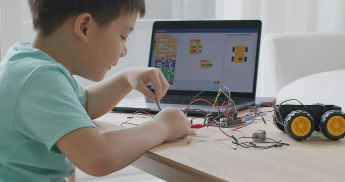 Small kid children make coding scratch car upskill STEAM lifestyle.