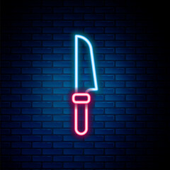 Glowing neon line Knife icon isolated on brick wall background. Cutlery symbol. Colorful outline concept. Vector