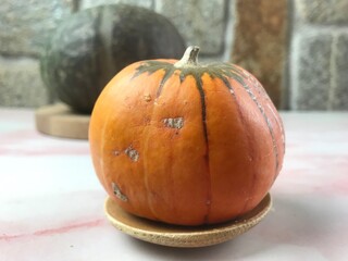 pumpkin on a wooden table