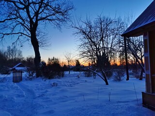 evening winter sky in the village sunset