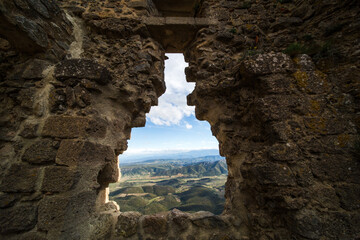 View of Aude Valley and Landscape from Queribus Cathar Castle Window Opening on a Sunny Day in France