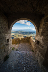 View of Aude Valley and Landscape from Queribus Cathar Castle Entrance Door on a Sunny Day in France