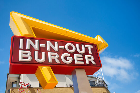 A Vibrantly Colored In N Out Burger Sign In San Francisco California