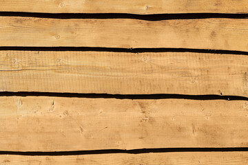 The surface of the wooden element of the outer wall of the house