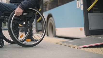 Person with a physical disability leaves public transport with an accessible ramp - Powered by Adobe