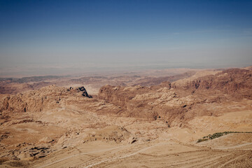 Fototapeta na wymiar The mountains. Desert. Deserted landscape and clear sky. Mountain landscape of Jordan from above. Jordan, Middle East