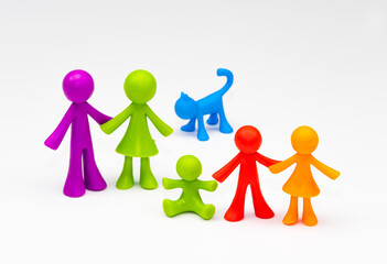Colorful family figure made of silicone on white background