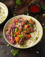 Vegan fried tempeh with rice and vegetables. Asian healthy food