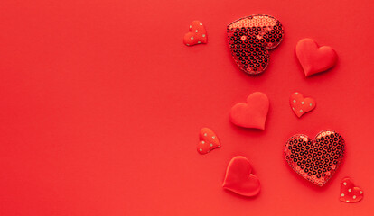 Valentine's day or Wedding romantic concept. Red hearts on red background.Top view, flat lay, copy space.