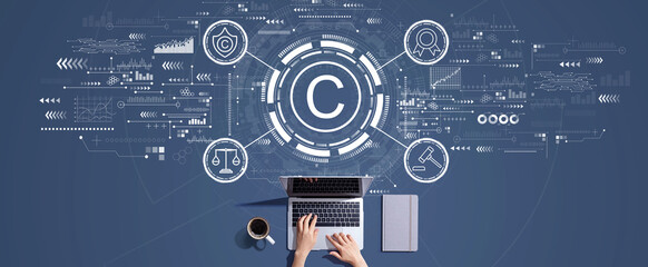 Copyright concept with person working with a laptop