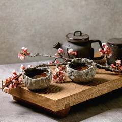 Fototapeta na wymiar Tea drinking wabi sabi japanese style dark clay cups