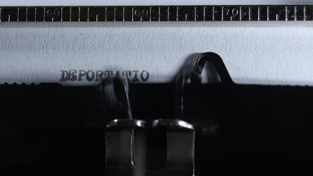 Typing DEPORTATION ORDER with an old manual typewriter