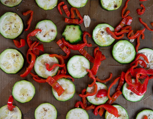 Zucchini, Pepper, Garlic and Oil On Baking Tray