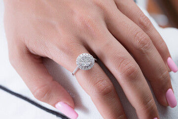 Diamond jewelry. Diamond rings on woman finger
