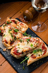 Homemade sliced classic italian pizza copy space top view