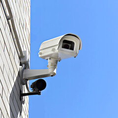 video surveillance camera on a wall of the building