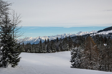Fantastic panoramic view of snow mountain range stick out of inversion fog layer. Great panorama...