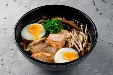Japanese ramen soup with chicken, egg and sprout