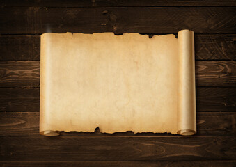 Old mediaeval paper sheet. Horizontal parchment scroll on a wood board