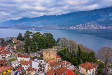 Aerial view of Ioannina city in Greece, Aslan Pasha Tzami, the lake with the island of Kyra Frosini...