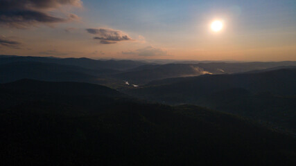 Mountains forest at sunset top view