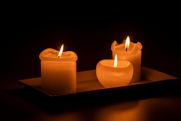 three burning candles, Mallorca, Balearic Islands, Spain