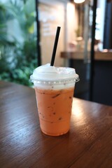 Iced thai tea in a cup - 479398022