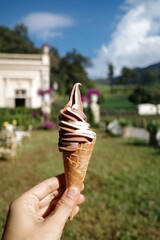 soft serve ice cream in a waffle cone - 479398042
