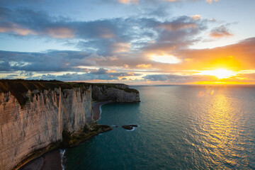 Dramatic sunset on the coast in Etretat, France