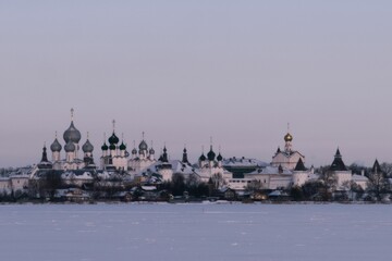 Temples of the sity of Rostov the Great on the shore of the lake in winter