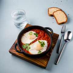 shakshuka scrambled eggs with tomatoes in Arabic