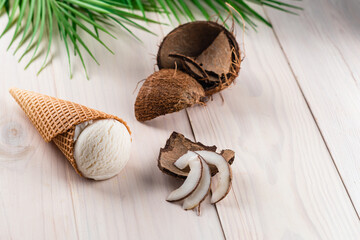 coconut ice cream on a white wooden background