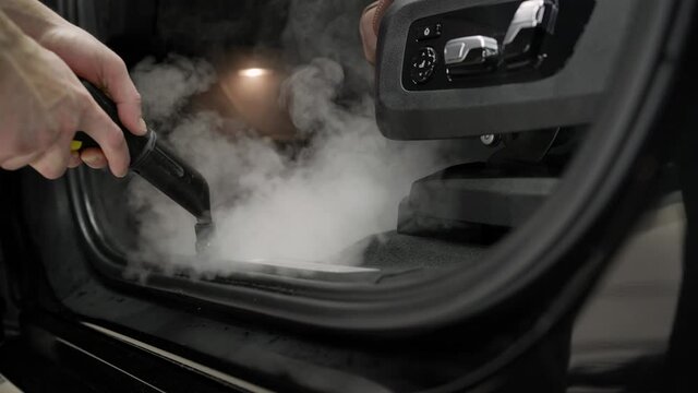 Cleaning The Car Interior With Steam. Car Detailing Service Deep Interior Cleaning. Detailing The Car.