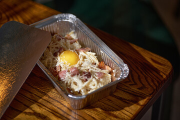 Pasta spaghetti carbonara with egg. Italian cuisine.